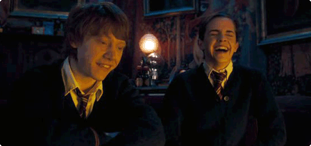 Rony e Hermione rindo